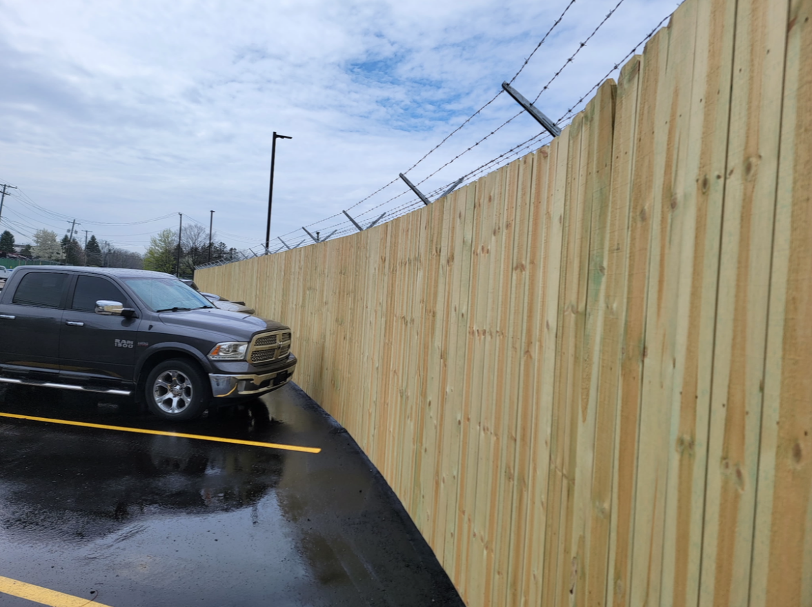 Residential wood fence installation in Oakland County
