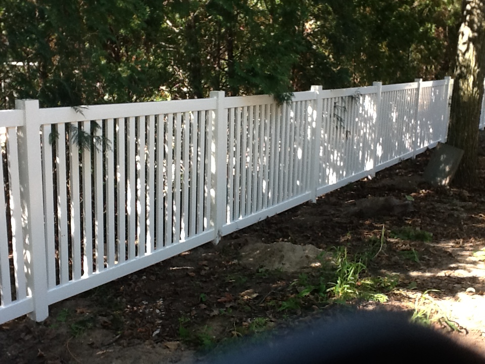 White PVC fence installation in Oakland County Michigan